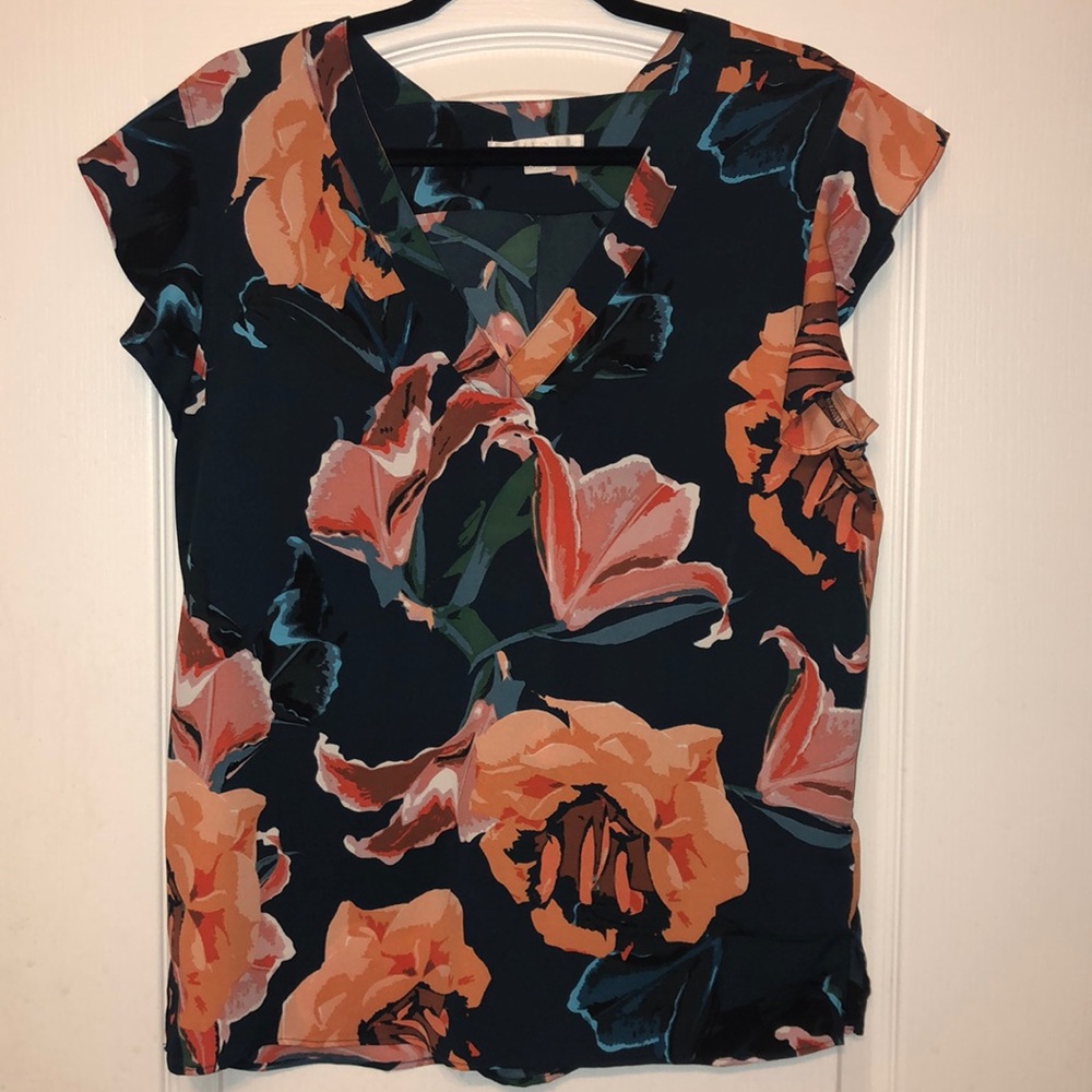 Blue v-neck blouse with bright flowers
